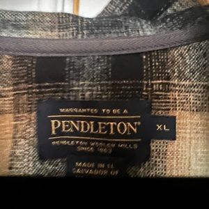 Pendleton unlined jacket with a hood and drawstrings.